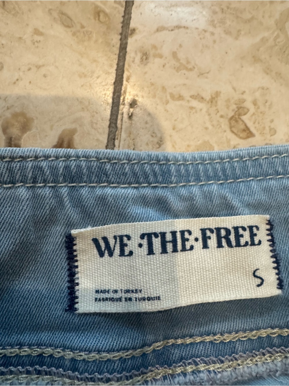 We The Free faded blue denim jeans